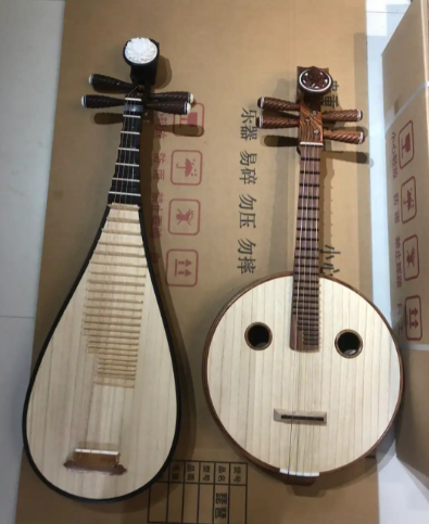 弦上春秋：中阮与琵琶的形韵之辨