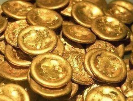 揭秘历史之谜：西安曲江乱坟岗金饼的起源与王莽的关联