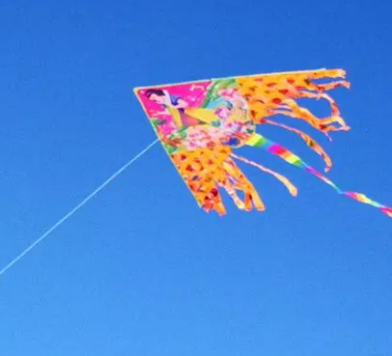 What is the traditional meaning of kite flying on Qingming Festival, and what does kite flying symbolize?