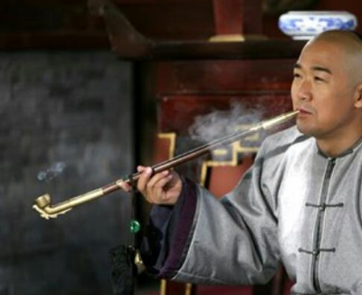 What is the origin of smoking in ancient times and what is its history?