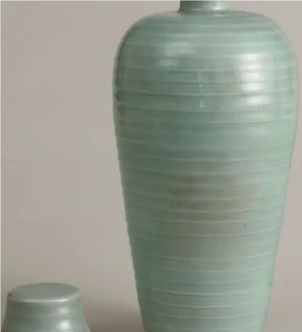 地理与文化：探索南青北白瓷器格局的形成原因