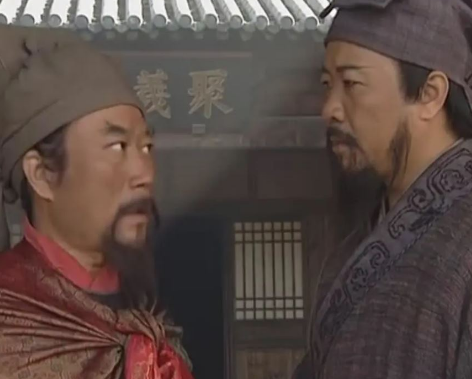 吴用宋江墓前自缢：忠义与绝望的交织