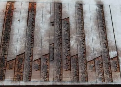 What are movable type printing and woodblock printing? What do they refer to?