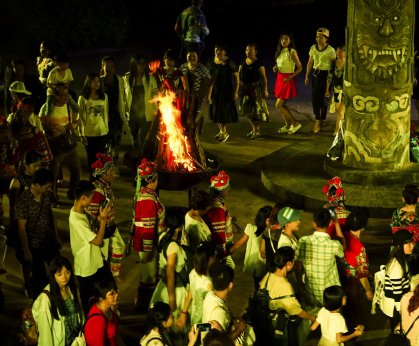 What is the origin of Torch Festival? When does it take place?