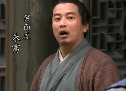水浒传朱富的性格特点是什么?是正面形象吗？